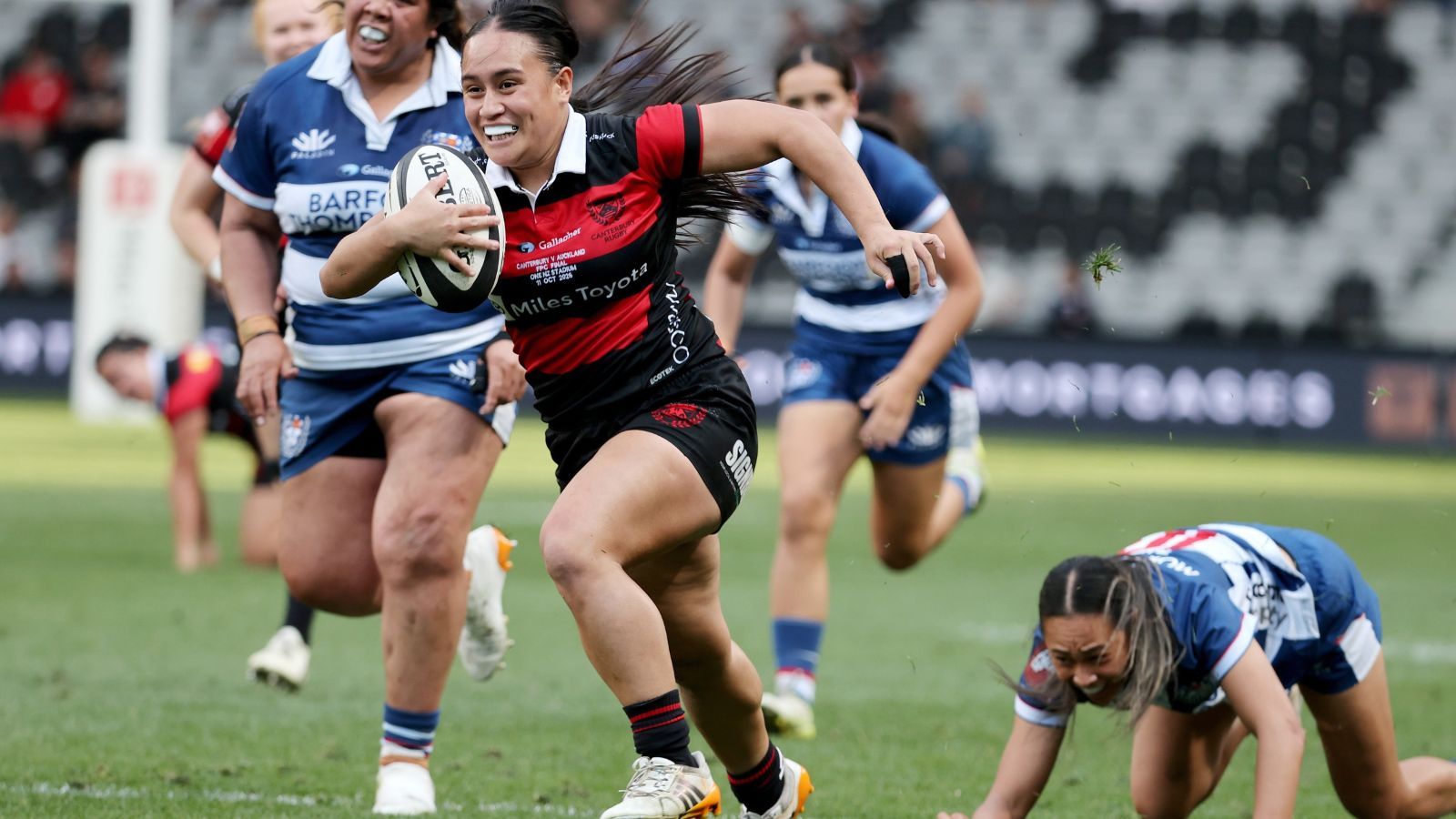 Canterbury women's rugby players celebrate a home Farah Palmer Cup final win.