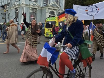 People taking part in Akaroa French Festival parade activity.