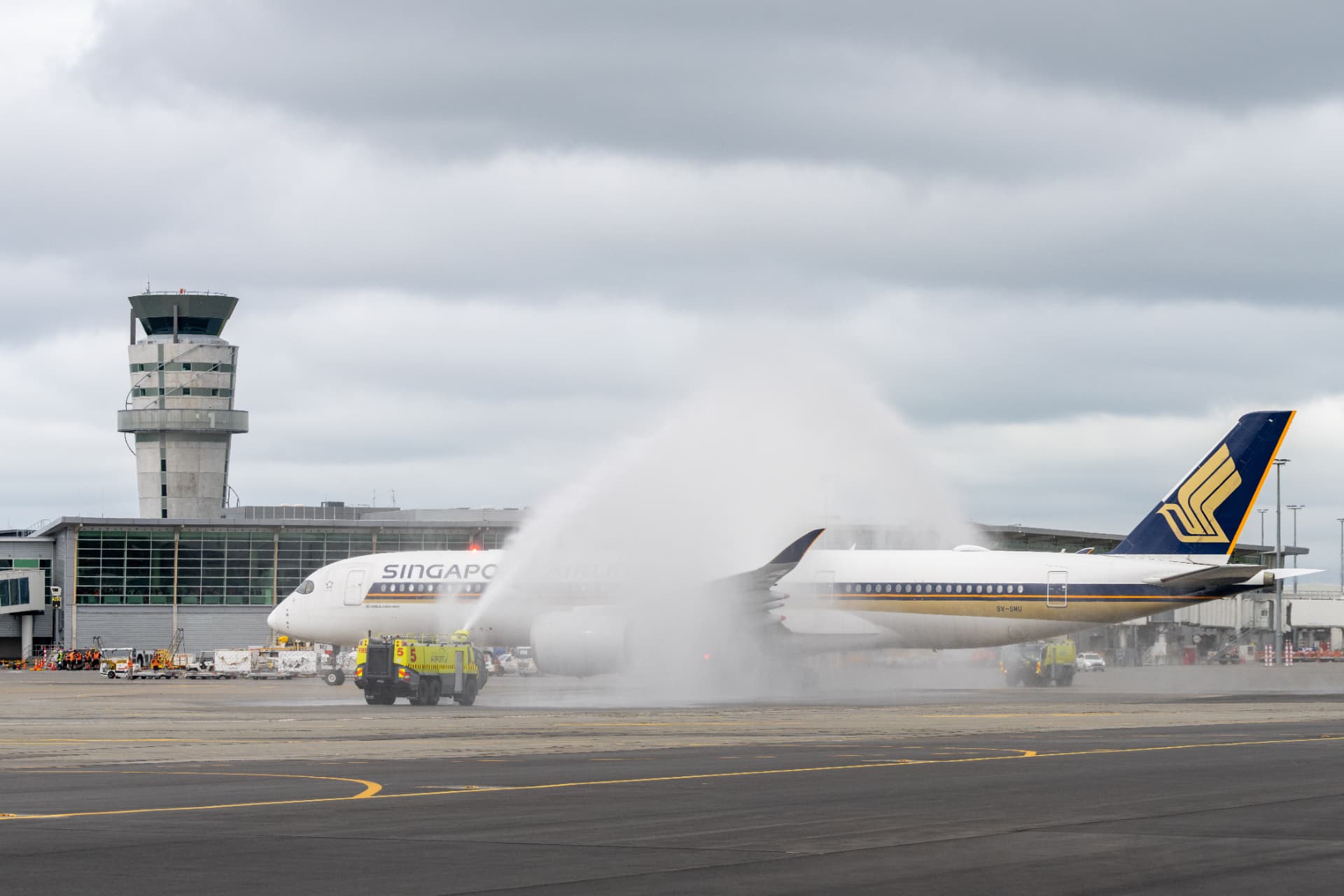 Singapore Airlines Airbus A350 receiving a water arch at Christchurch Airport.